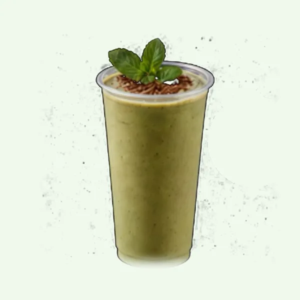 Mint To Be Healthy smoothie made with chocolate almond milk, whey chocolate protein, almond butter, peppermint, spinach, banana, cacao nibs on top