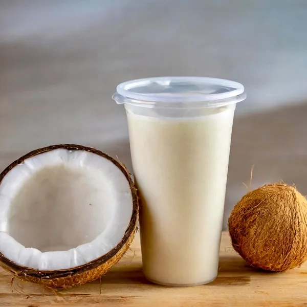 Pina Colada smoothie made with coconut milk, banana, coconut, pineapple