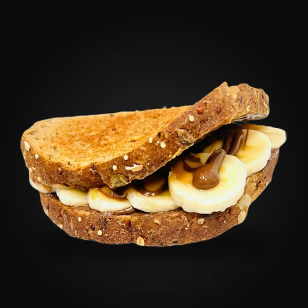 Reese’s Peanut Butter Toast: whole grain toast filled with banana slices and a peanut butter and chocolate drizzle